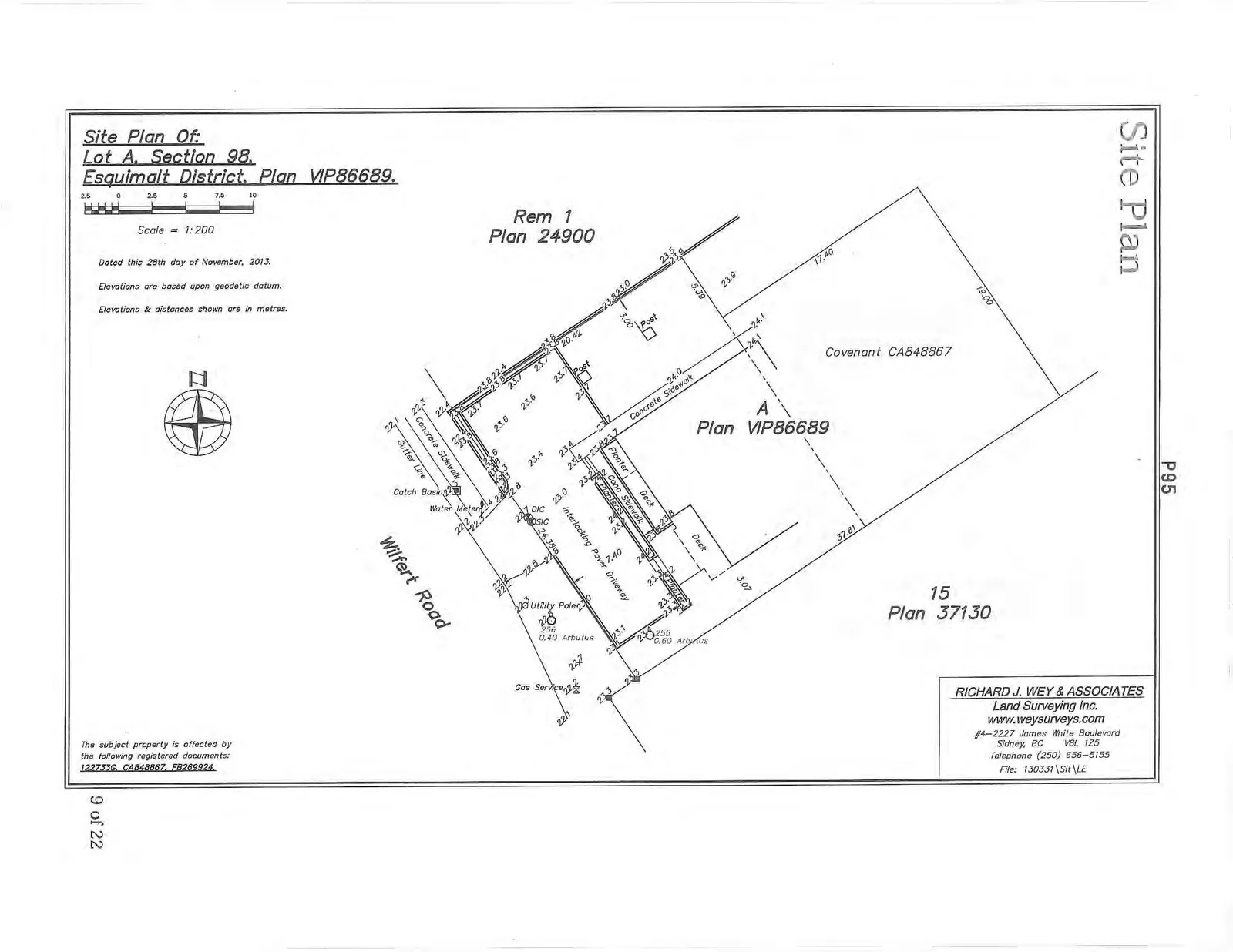 Site plan for Lot A, Section 98 on Wilfert Road, showing property boundaries, dimensions, and existing features including a concrete sidewalk, interlocking paver driveway, deck, planter, and utility locations (gas service, utility pole, water meter). Adjacent properties identified include Rem 1 Plan 24900 to the north and 15 Plan 37130 to the south.
