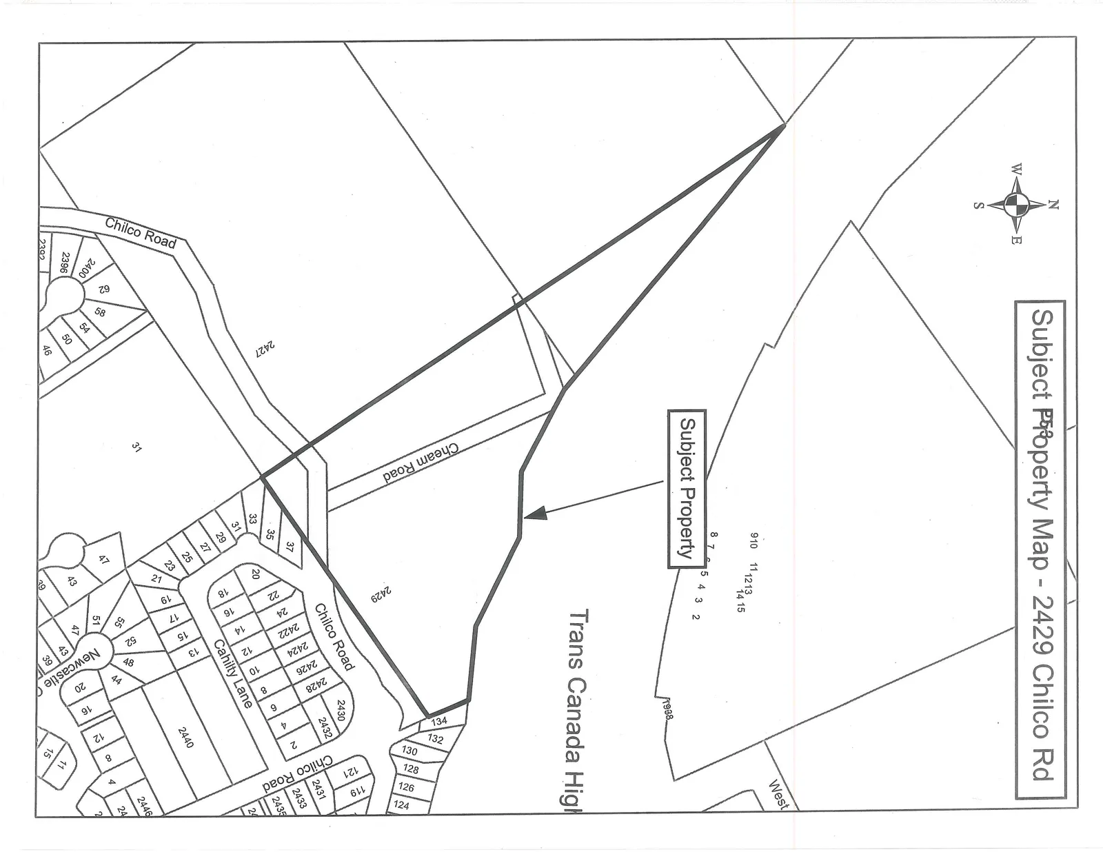 A property map identifying 2429 Chilco Rd as the Subject Property. The map shows the large, triangular lot bounded by Cheam Road and Chilco Road, with the Trans Canada Highway situated to the north. Neighboring streets including Cahilty Lane and Newcastle are shown with individual residential lot subdivisions and street numbers.
