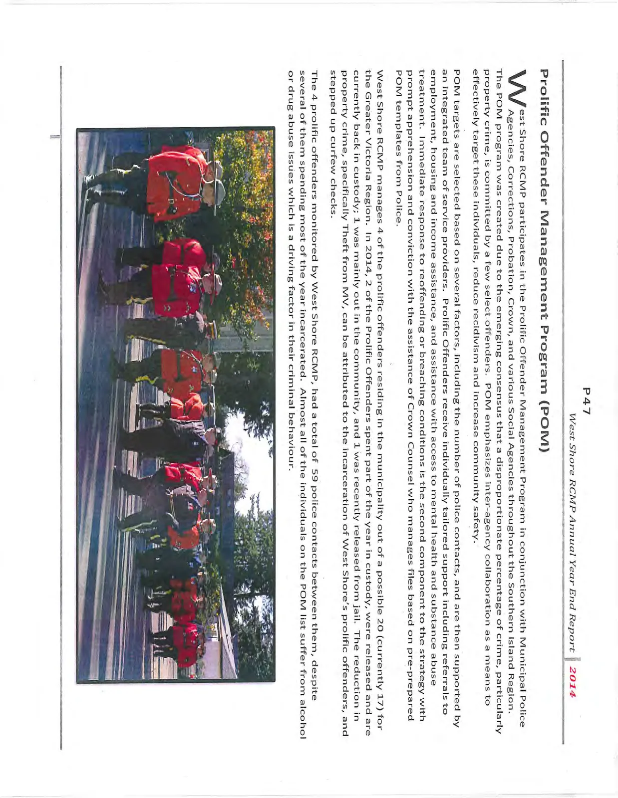 Photograph of RCMP officers in ceremonial Red Serge at a community event