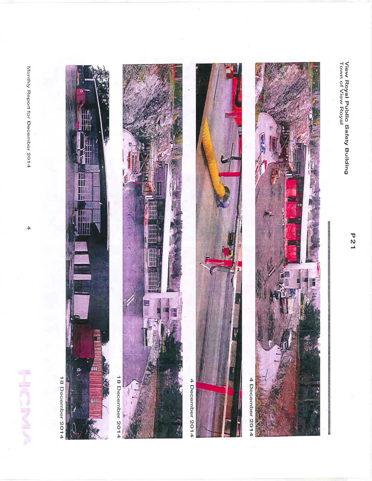 Wide shot of building construction site with rock wall and red protective covers on window bays, 4 December 2014