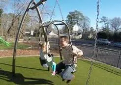 Parent and child interacting on an Expression Swing