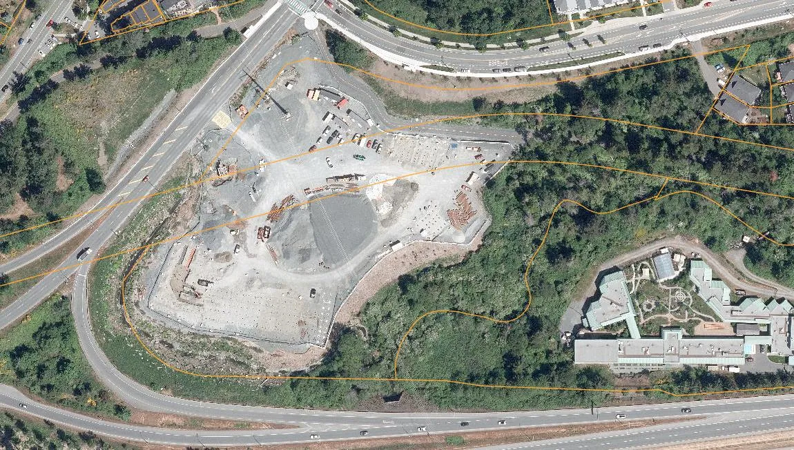 Aerial map showing the subject property at 2401 Burnside Rd W, located between Burnside Rd W, Watkiss Way, and the Trans-Canada Hwy