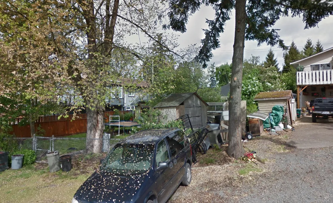 Photo from Conard Street looking North at a boat and driveway area