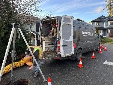 Professional service van and equipment setup for trenchless manhole sealing