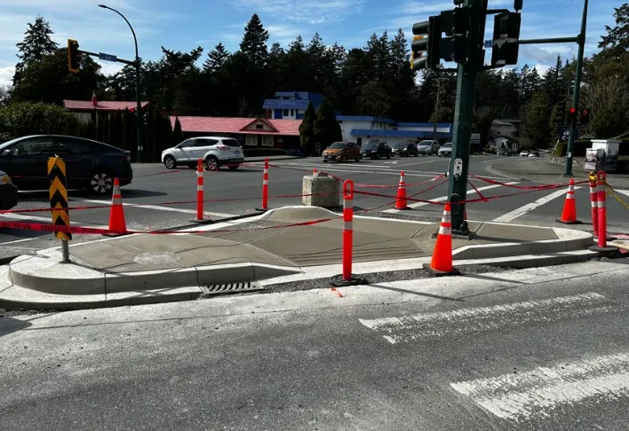 New concrete curb and sidewalk construction at 258 Helmcken