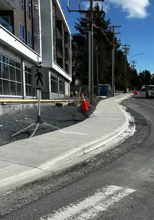 View of the new traffic island and concrete infrastructure at 258 Helmcken