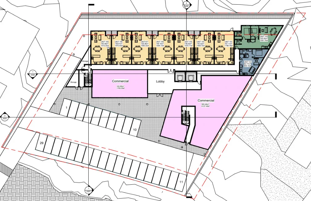 Ground floor site plan illustrating commercial areas, lobby, and surface parking layout