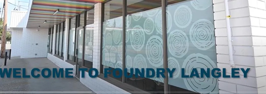 Video thumbnail for "Welcome to Foundry Langley" showing the exterior storefront with circular decals
