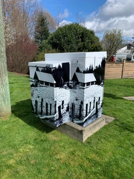 Traffic signal cabinet with vinyl wrap featuring a historic 1948 photo