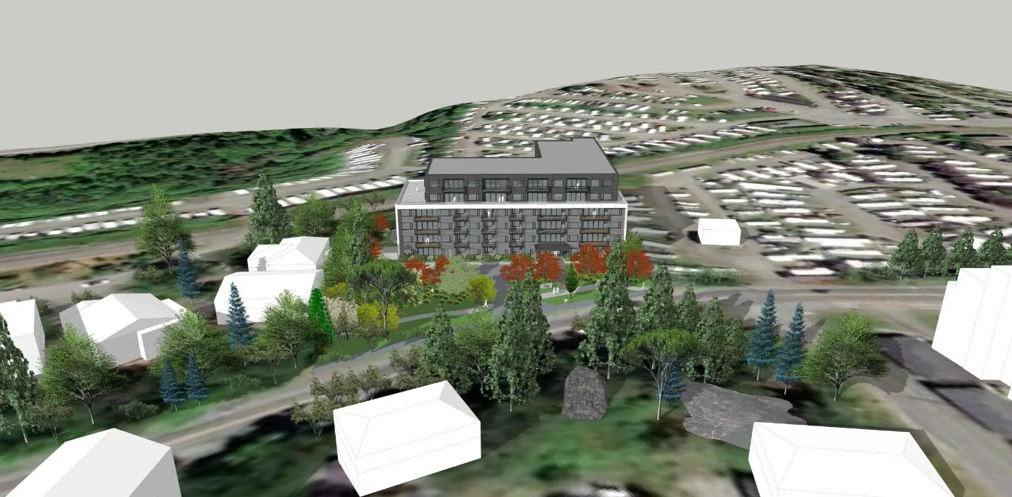 Bird’s eye view conceptual rendering of the proposed apartment building looking over Island Highway