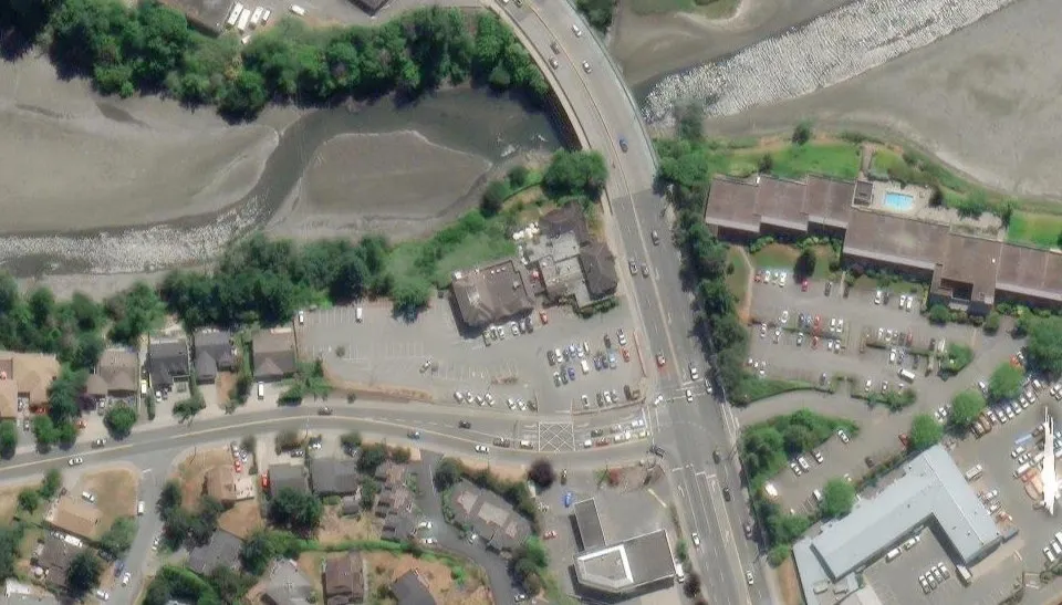 Aerial site plan of the Six Mile Pub property showing property boundaries, the location of a proposed digital message sign, and surrounding features including a gas station and a bridge.
