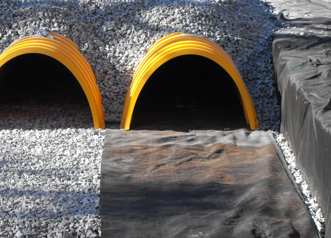 Two MC-3500 StormTech chambers installed within a stone bed