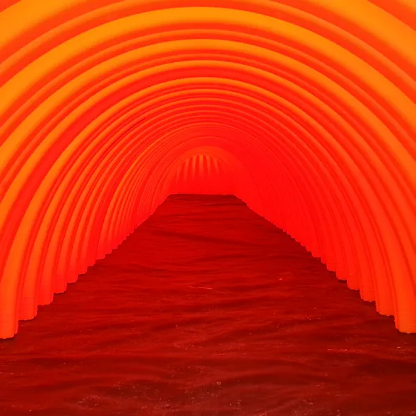 Interior view of a StormTech Isolator Row chamber showing the woven geotextile base