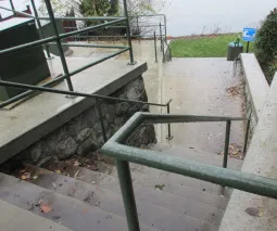 View looking down the stairs to the lower landing