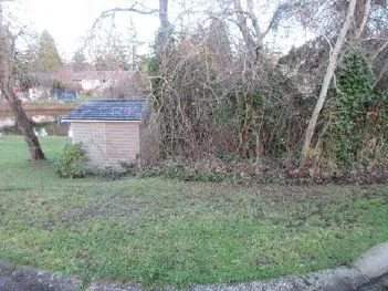 View from parking to north neighbour’s rear garden (148 Werra Road)