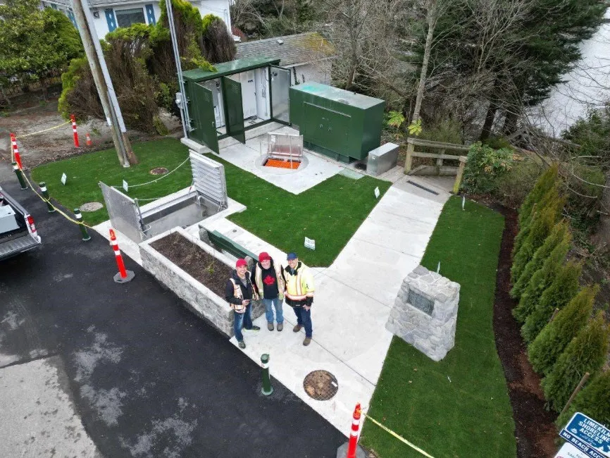 Aerial view of staff and the completed Helmcken Bay Pump Station upgrade