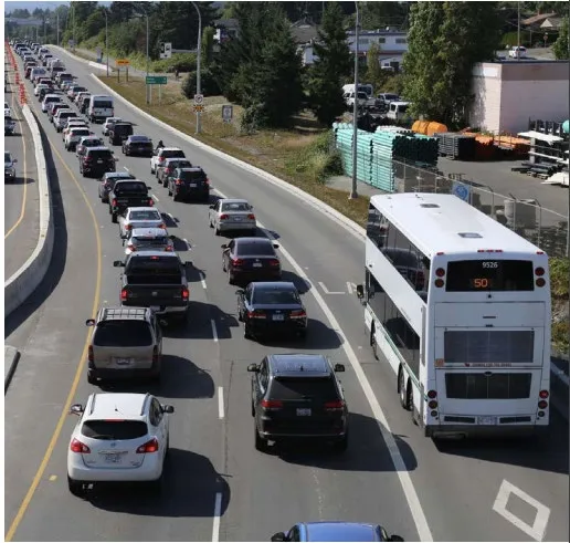 View of a double-decker bus in a queue of heavy traffic on a highway
