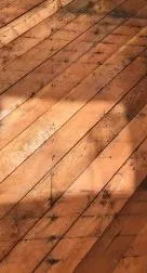 Close-up of diagonal wood subflooring or sheathing