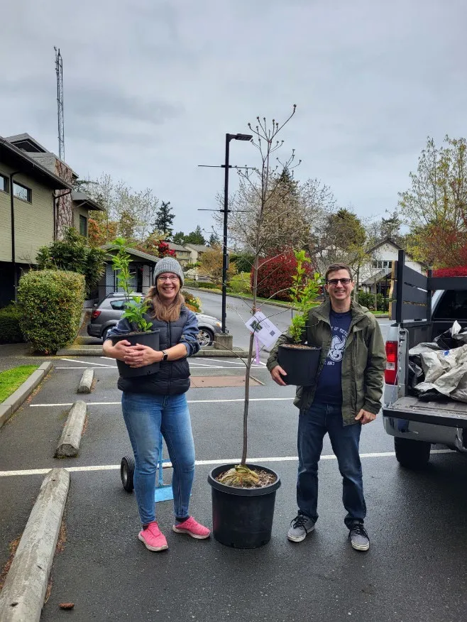 happy new owners of a Dogwood and June Plum trees