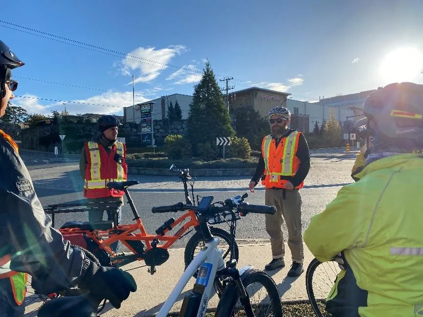 Participants in high-visibility gear gathered at the E&N Rail Trail and View Royal Elementary School.