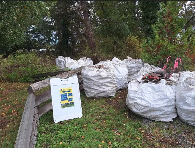 Stillwater Road End after volunteer work, with bags of debris