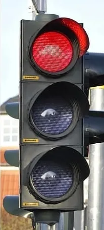 a traffic light showing a red signal