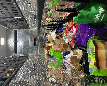 Interior of Rescue 36 filled with donated bags of food