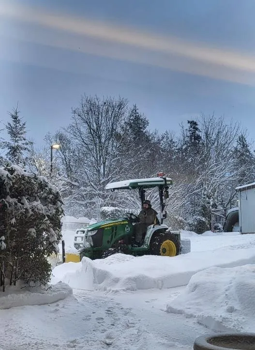 Parks staff clearing snow with a tractor