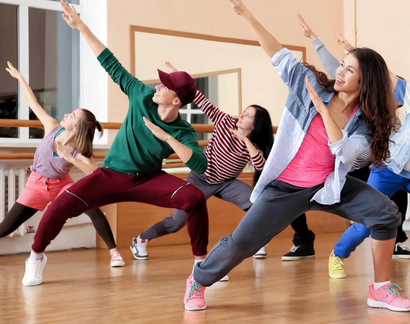 Group of dancers practicing in a dance studio