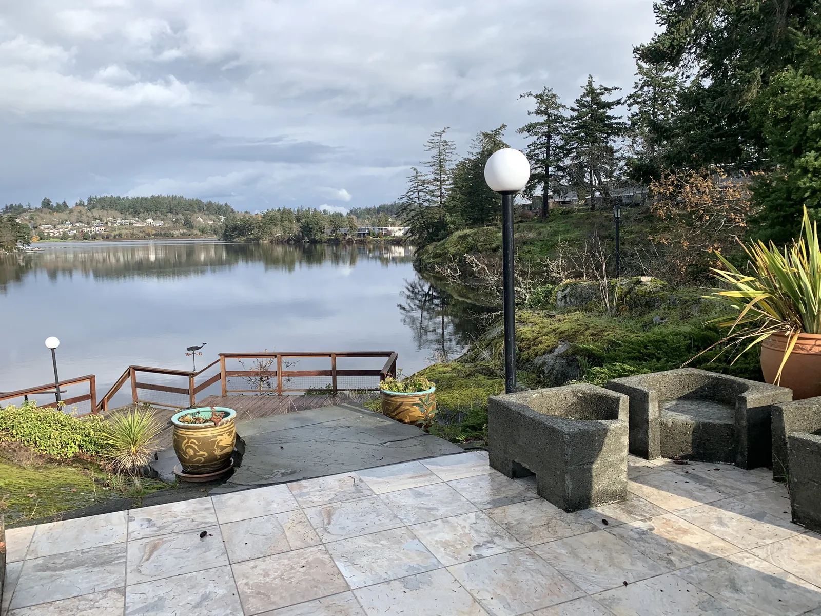 Photo 3 showing patio, bedrock, and walkway to deck