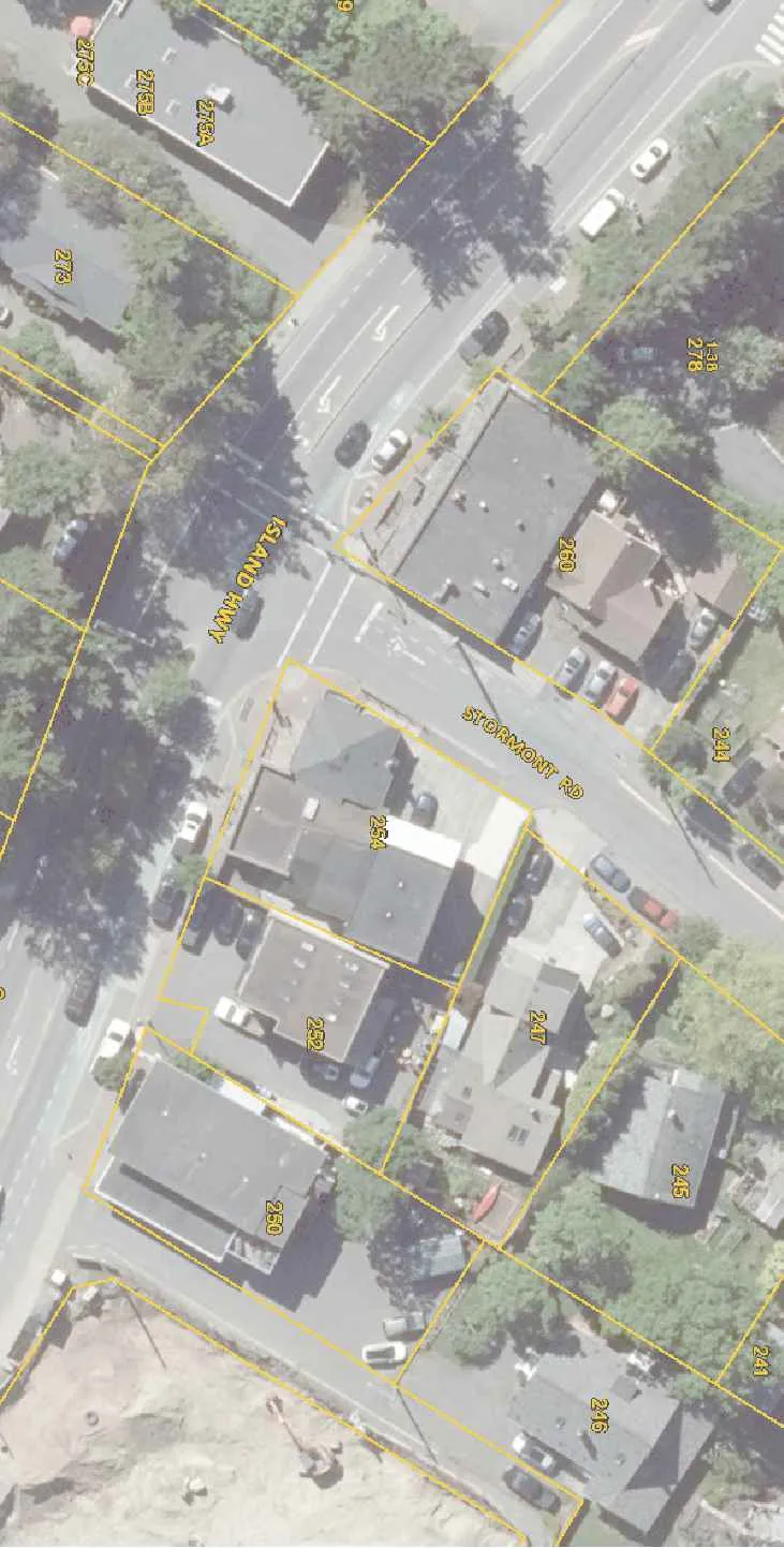 Aerial view of the intersection of Stormont Road and Island Highway, showing property lots 260, 254, 252, 250, 247, and 245.