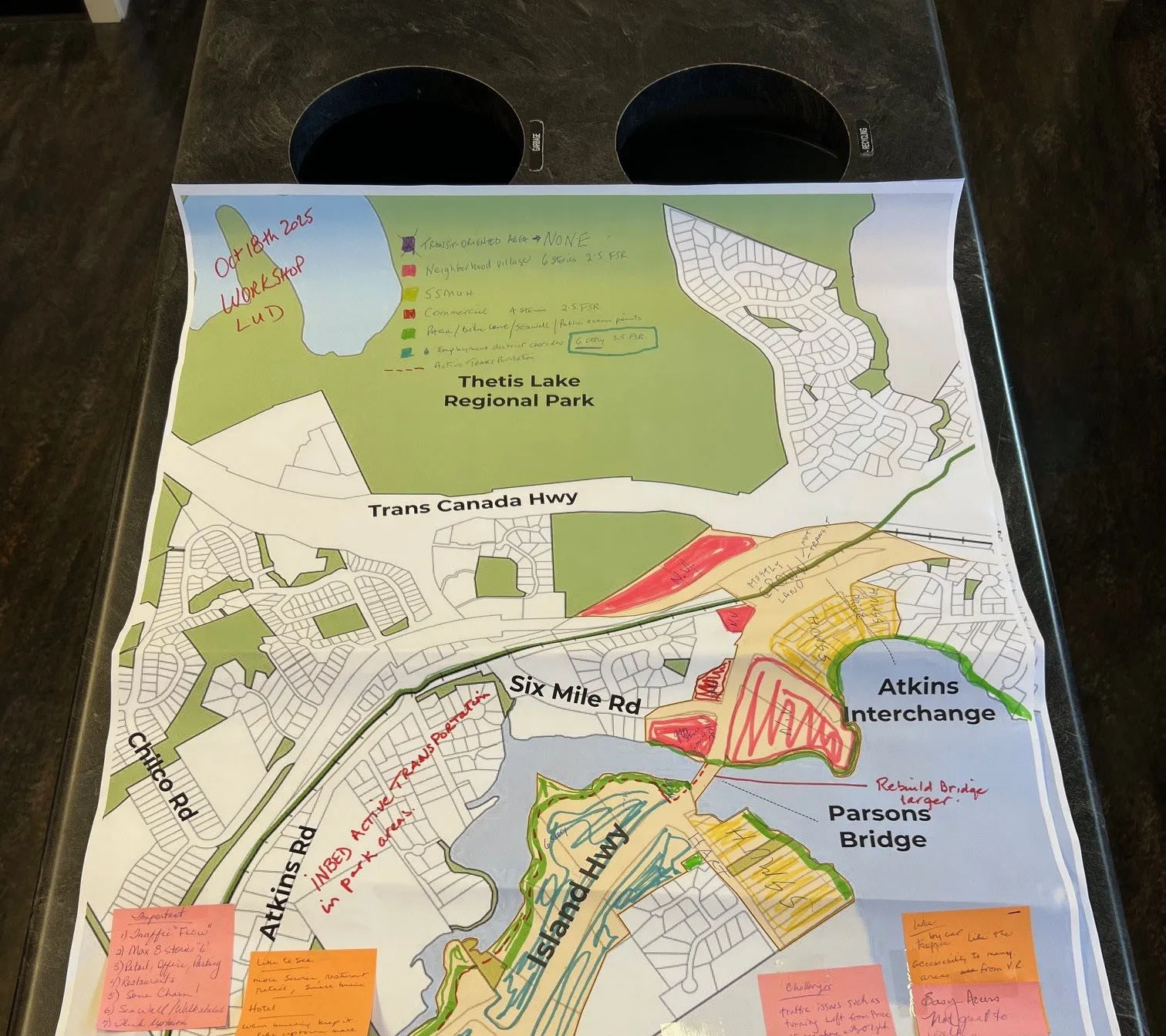 Color-coded land use map with workshop feedback sticky notes