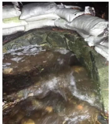 Water surcharging from a culvert bank protection structure