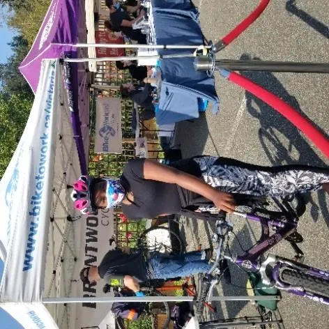 A cargo bike carrying two children