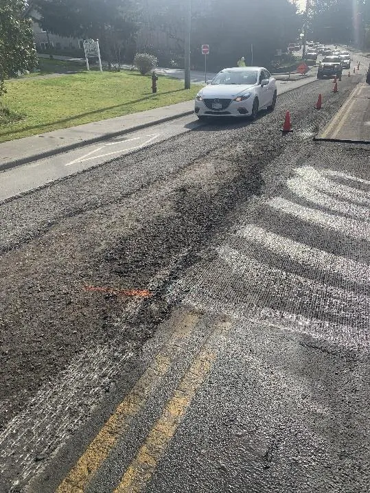 Photo of a damaged section of Island Highway undergoing repairs