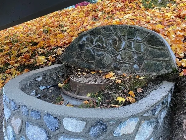 exposing sewer manholes