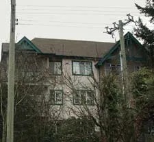 Detail of the West facade showing the residential lobby entrance