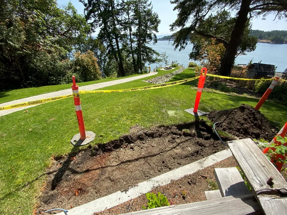 concrete pad being installed for the memorial bench at Beaumont Park