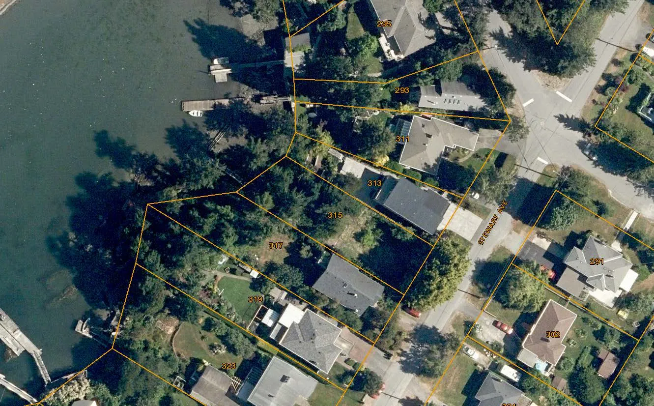 Aerial map showing the subject property at 315 Stewart Ave highlighted in red, adjacent to Esquimalt Harbour