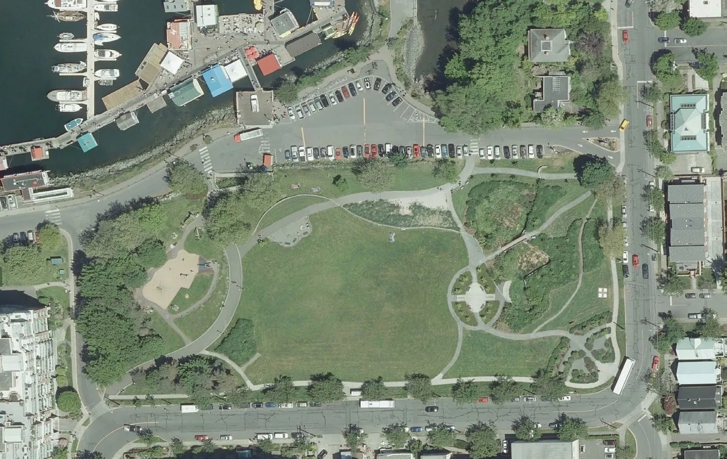Satellite orthographic imaging of a coastal city park used as a base for detailed map creation.