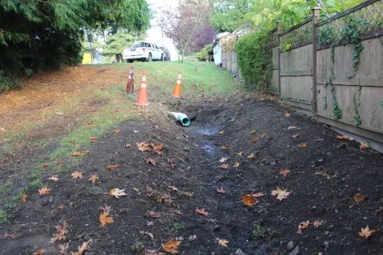 View of the completed drainage ditch project at the end of Chancellor Avenue