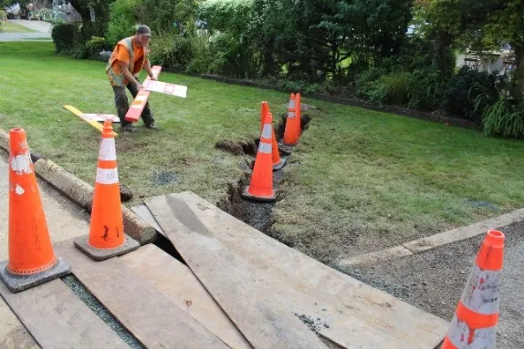 Construction area with safety cones for the catch basin installation at 292 Bessborough Avenue