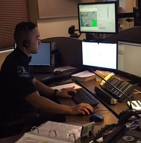 Dispatcher working at a computer station