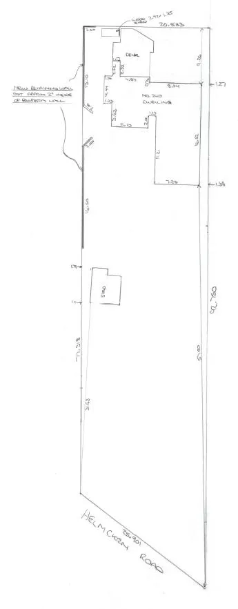 Site plan showing the layout of the property with the locations of the front and rear retaining walls