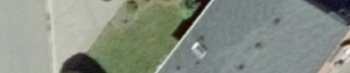 Aerial view crop of a rooftop with a skylight or vent