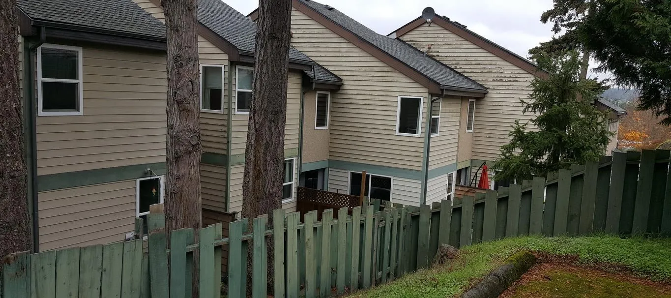 Photograph showing the existing condition of the building siding and exterior