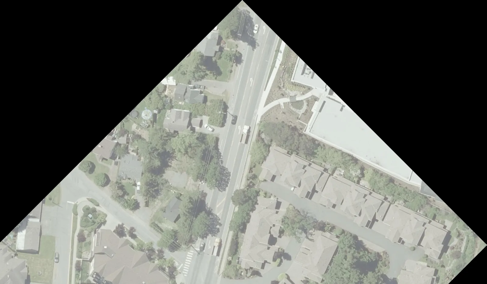 Aerial view of residential area and roadway south of Helmcken Road