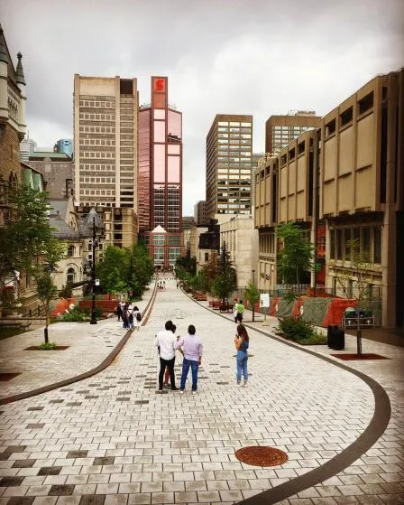 Example photograph of an urban woonerf with specialized paving and pedestrian prioritization