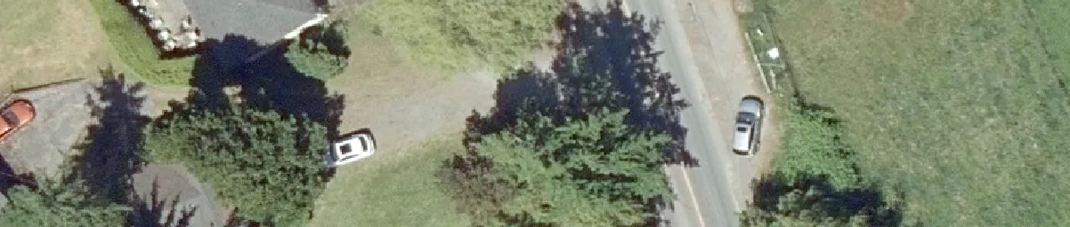 Aerial view of a parking lot with vehicles