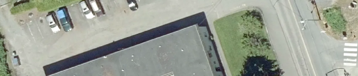 Aerial view of a building corner and road intersection